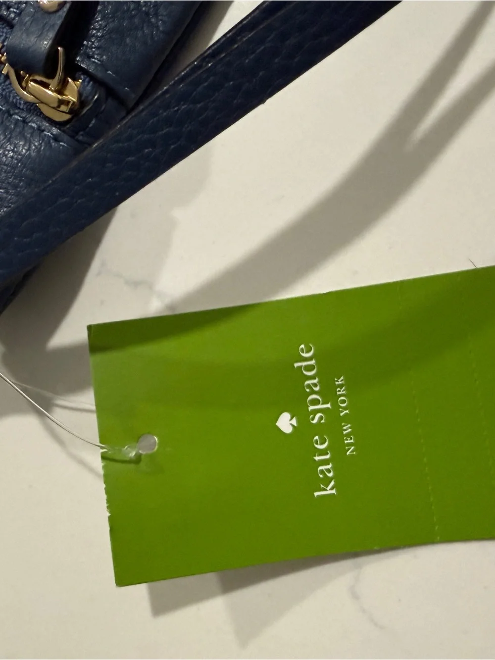 kate spade gold logo